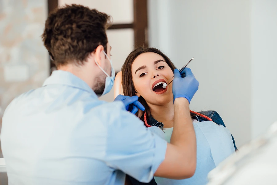 Professional teeth whitening consultation at Care N Cure Dental in Garland TX